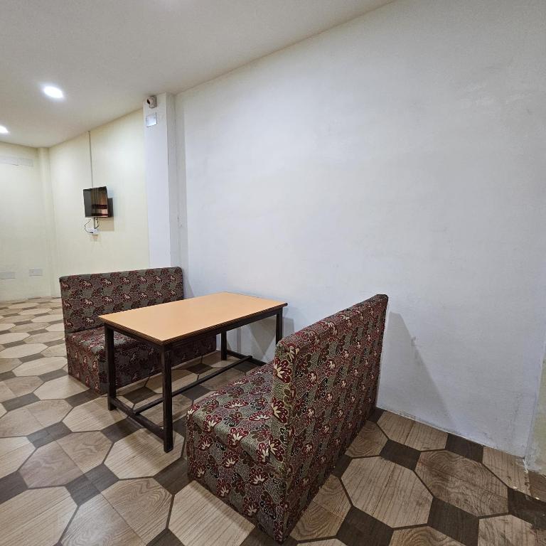 Posezení v ubytování Mahendra Hotel