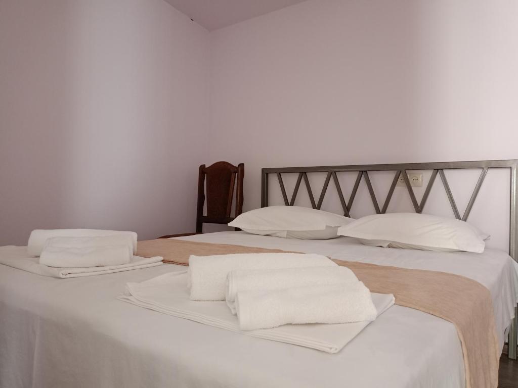 Postel nebo postele na pokoji v ubytování SELINA GUEST HOUSE