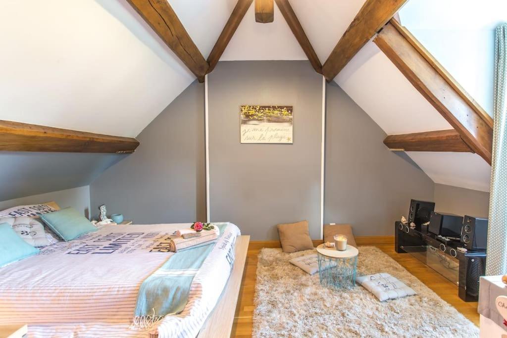 Postel nebo postele na pokoji v ubytování Les Anges