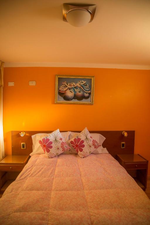 Postel nebo postele na pokoji v ubytování Wisny Inn