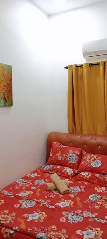 Postel nebo postele na pokoji v ubytování D'NAS HOMESTAY - Muslm Only