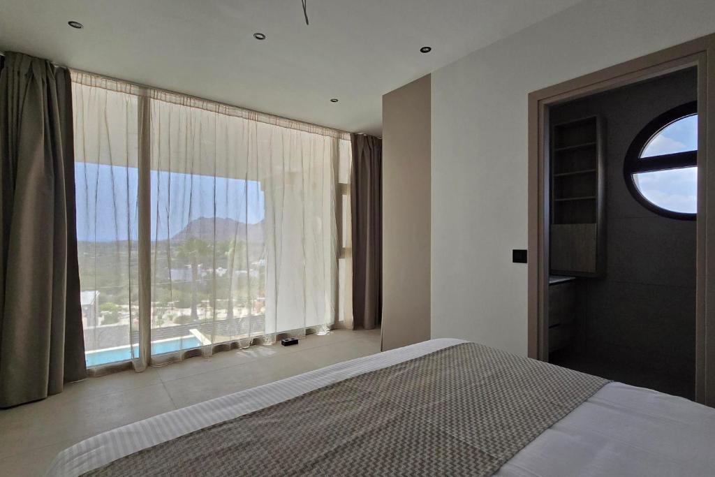 Postel nebo postele na pokoji v ubytování Trapezia Luxury Living