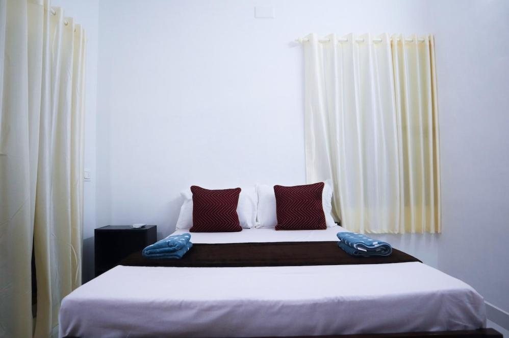 Letto o letti in una camera di Guestland Homestay