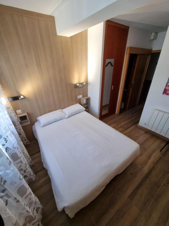 Postel nebo postele na pokoji v ubytování Hotel Avanti