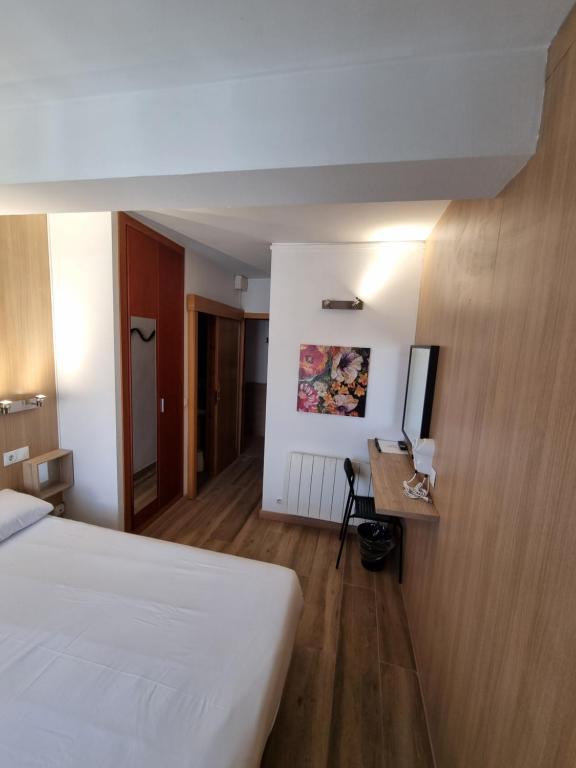 Postel nebo postele na pokoji v ubytování Hotel Avanti