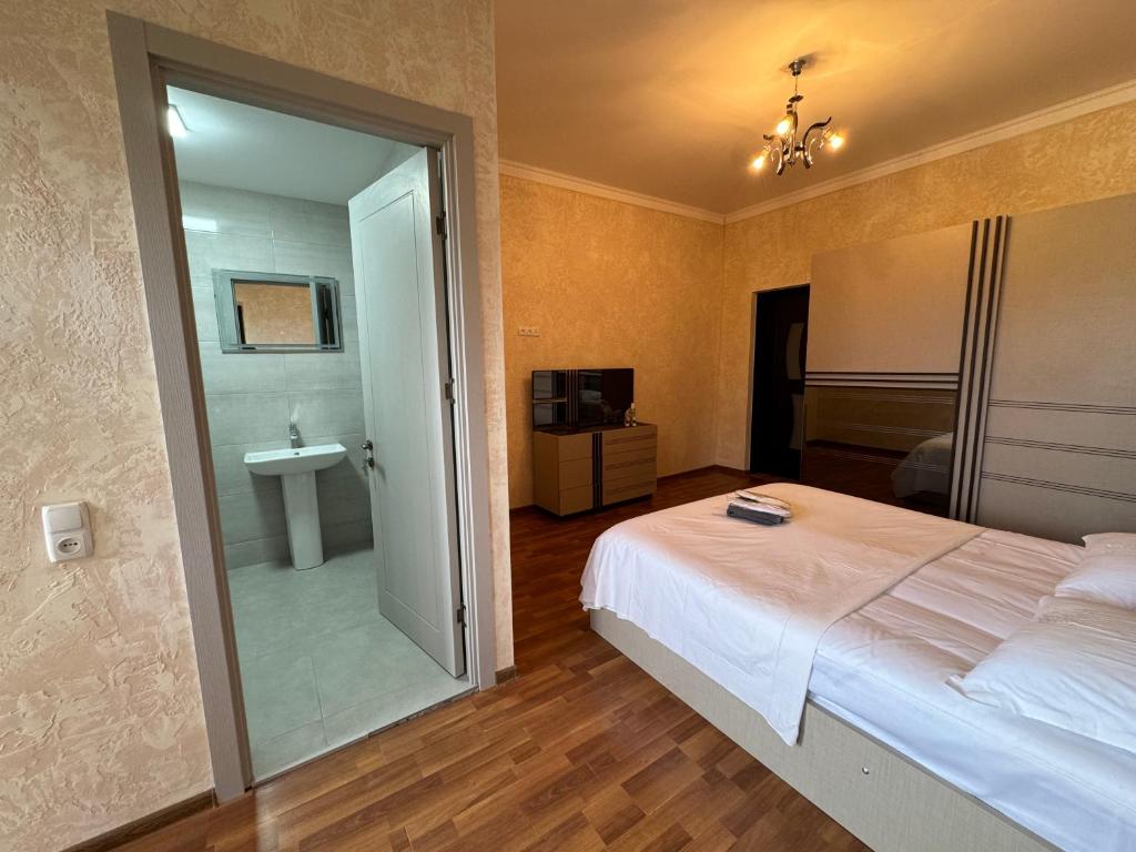 Postel nebo postele na pokoji v ubytování Nugo Villa