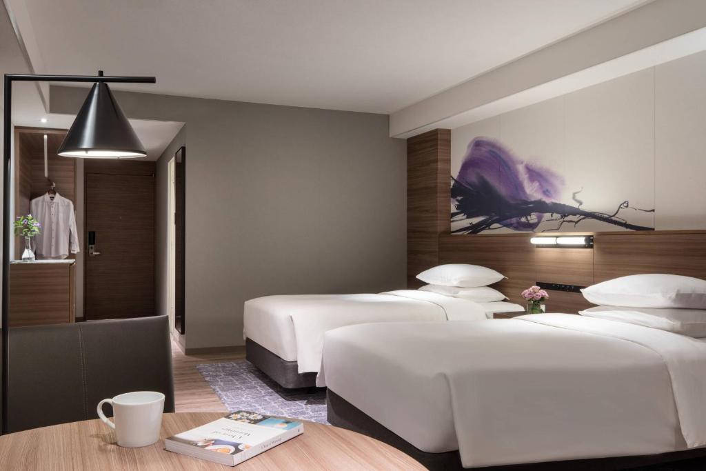 Postel nebo postele na pokoji v ubytování Lake Biwa Marriott Hotel