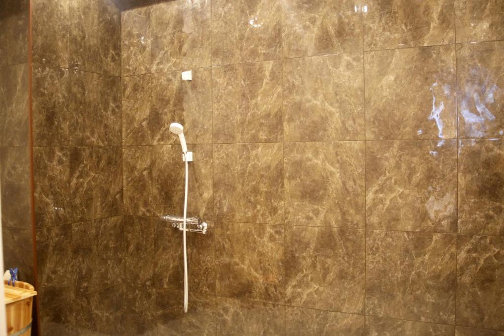 Koupelna v ubytování MIYAVI hotel