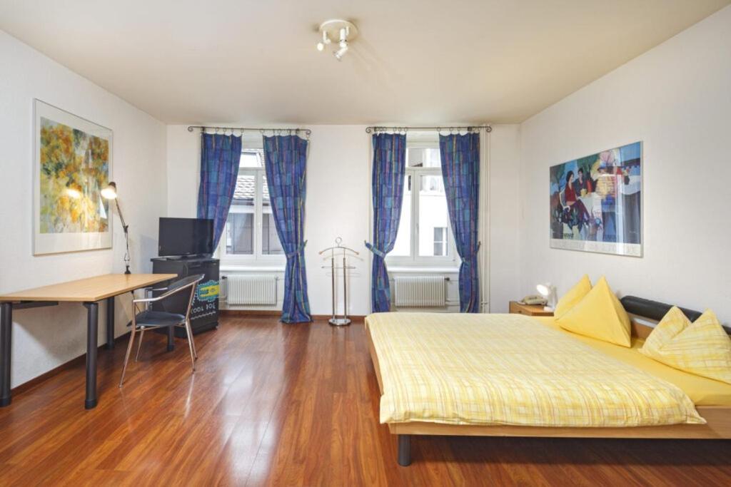 Postel nebo postele na pokoji v ubytování Residence zur Musegg