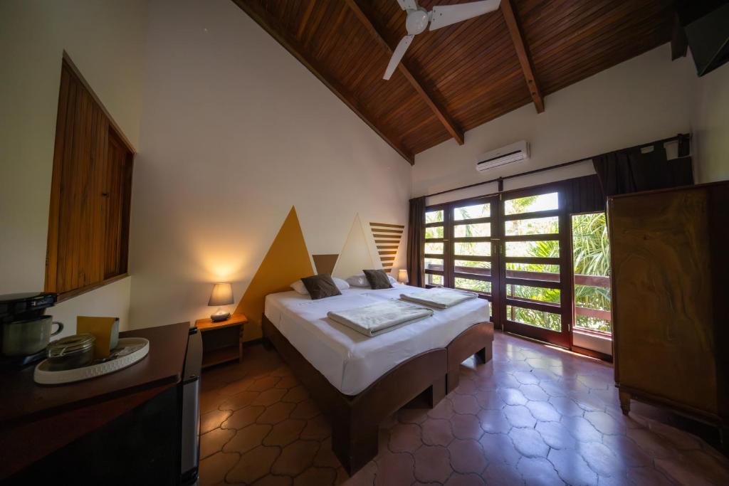 Postel nebo postele na pokoji v ubytování Hotel Villa Del Sol