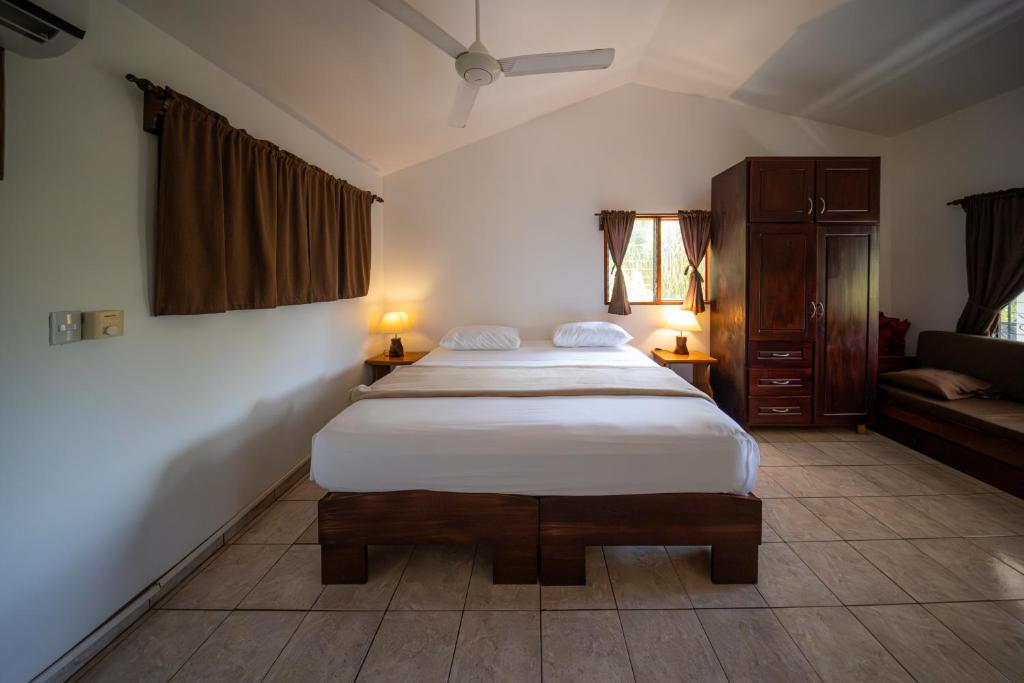 Postel nebo postele na pokoji v ubytování Hotel Villa Del Sol
