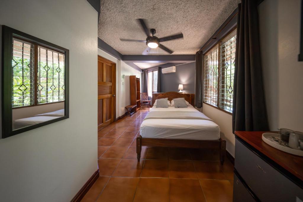 Postel nebo postele na pokoji v ubytování Hotel Villa Del Sol