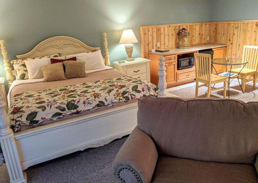 Ένα ή περισσότερα κρεβάτια σε δωμάτιο στο Springbrook Inn- Springbrook