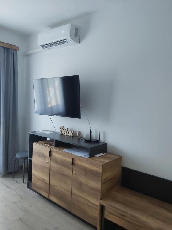 Televiisor ja/või meelelahutuskeskus majutusasutuses D&D Wellness Apartmanok - Dávid Wellness Apartman