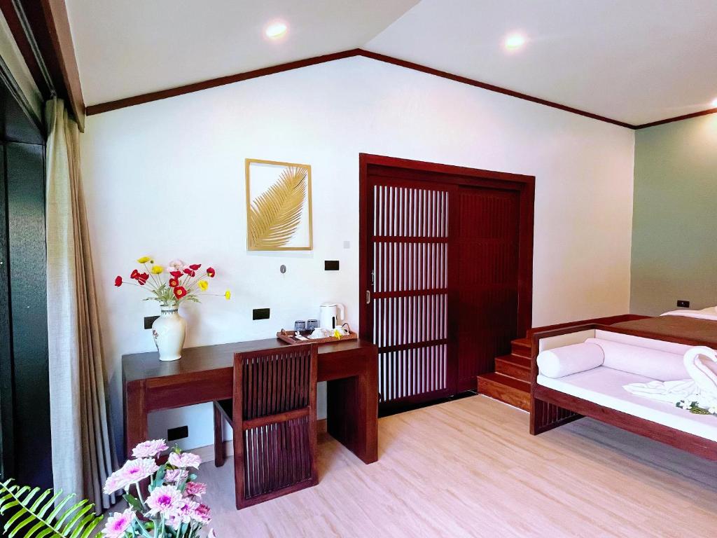Postel nebo postele na pokoji v ubytování begonia N7 villa resort海棠7号别墅酒店