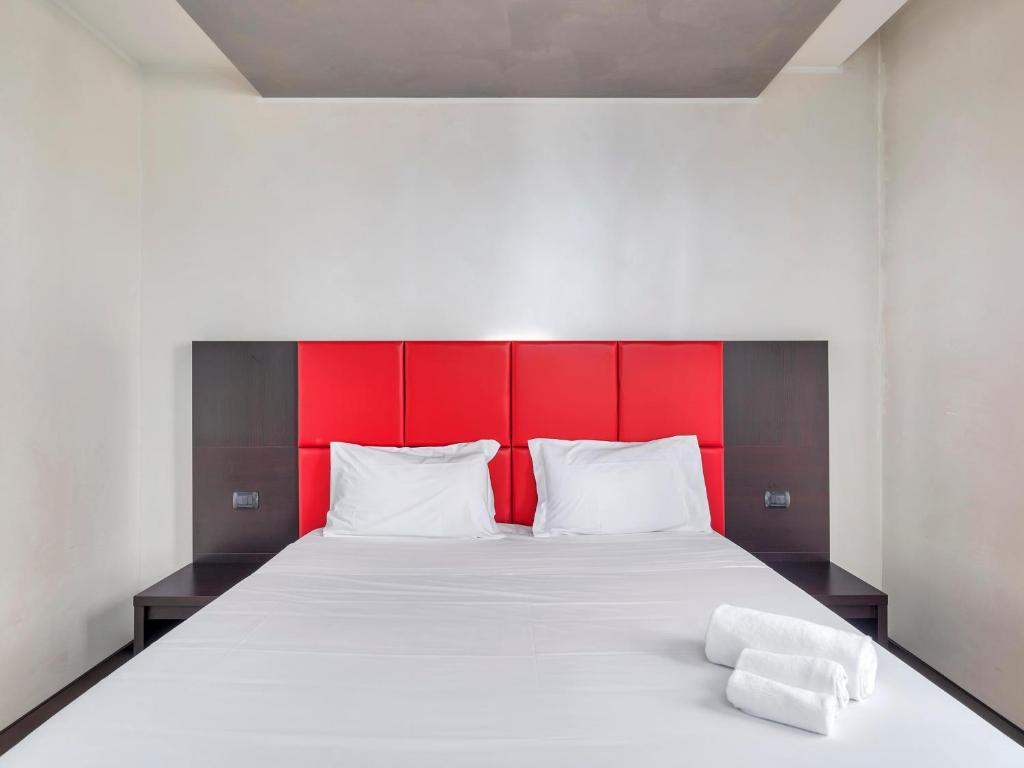 Postel nebo postele na pokoji v ubytování B&B HOTEL Park Hotel Cassano