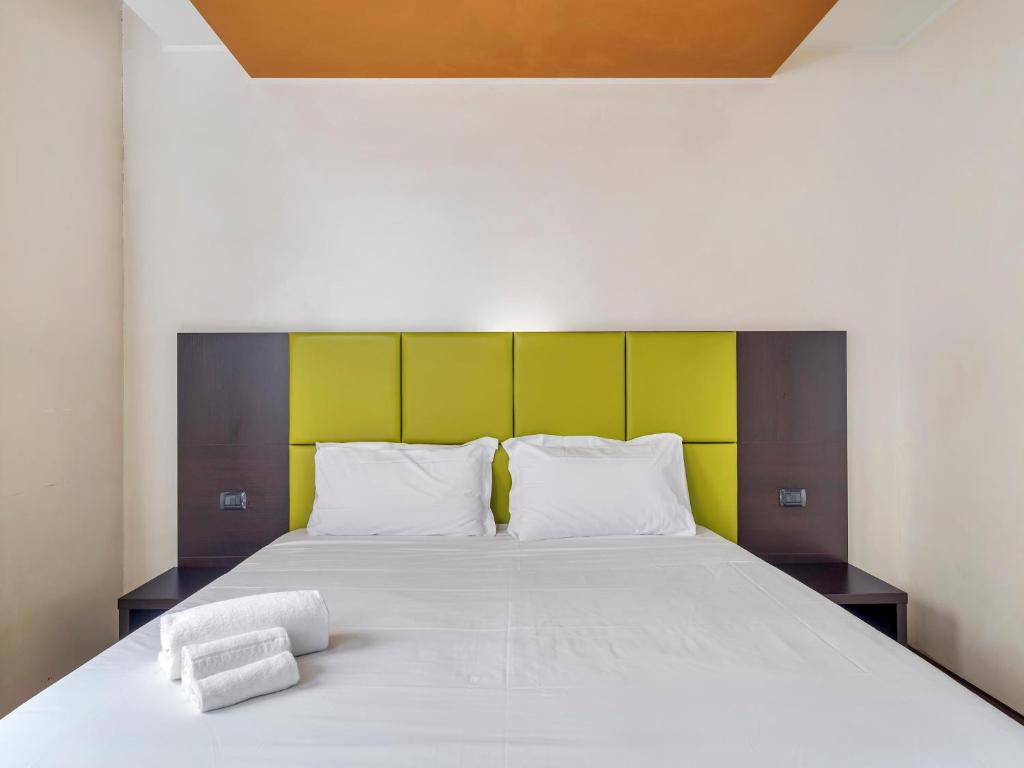 Postel nebo postele na pokoji v ubytování B&B HOTEL Park Hotel Cassano