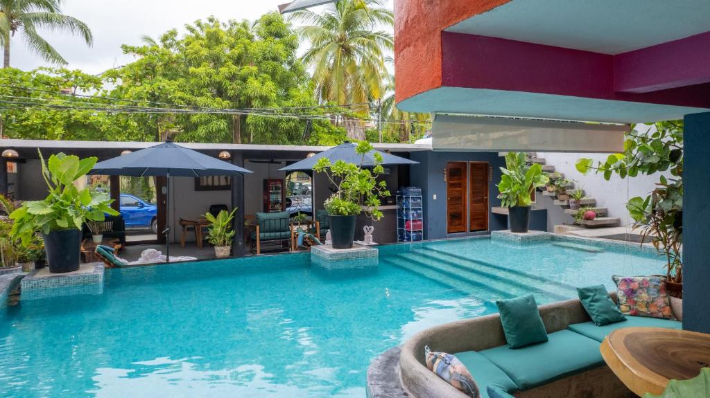 Bazén v ubytování Zihua Mia Hotel Boutique nebo v jeho okolí