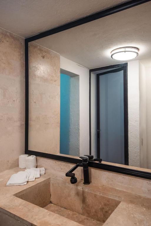 Koupelna v ubytování Zihua Mia Hotel Boutique