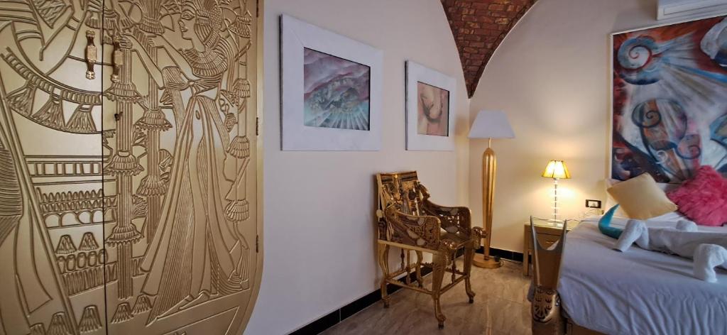 Postel nebo postele na pokoji v ubytování ATON PALACE Luxor