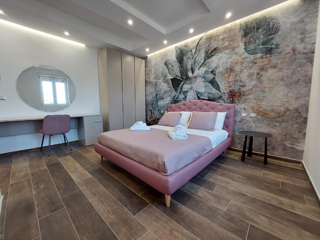 Postel nebo postele na pokoji v ubytování Dimora Gentile Lecce B&B