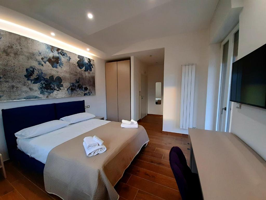 Postel nebo postele na pokoji v ubytování Dimora Gentile Lecce B&B
