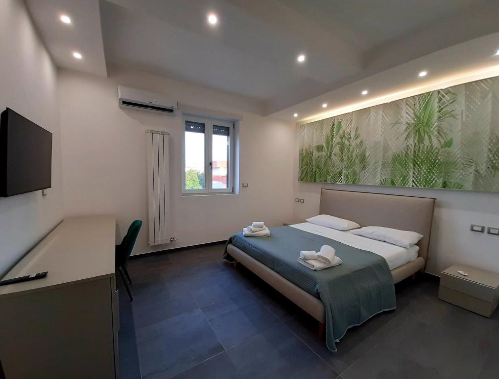 Postel nebo postele na pokoji v ubytování Dimora Gentile Lecce B&B
