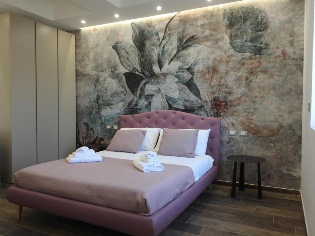 Postel nebo postele na pokoji v ubytování Dimora Gentile Lecce B&B