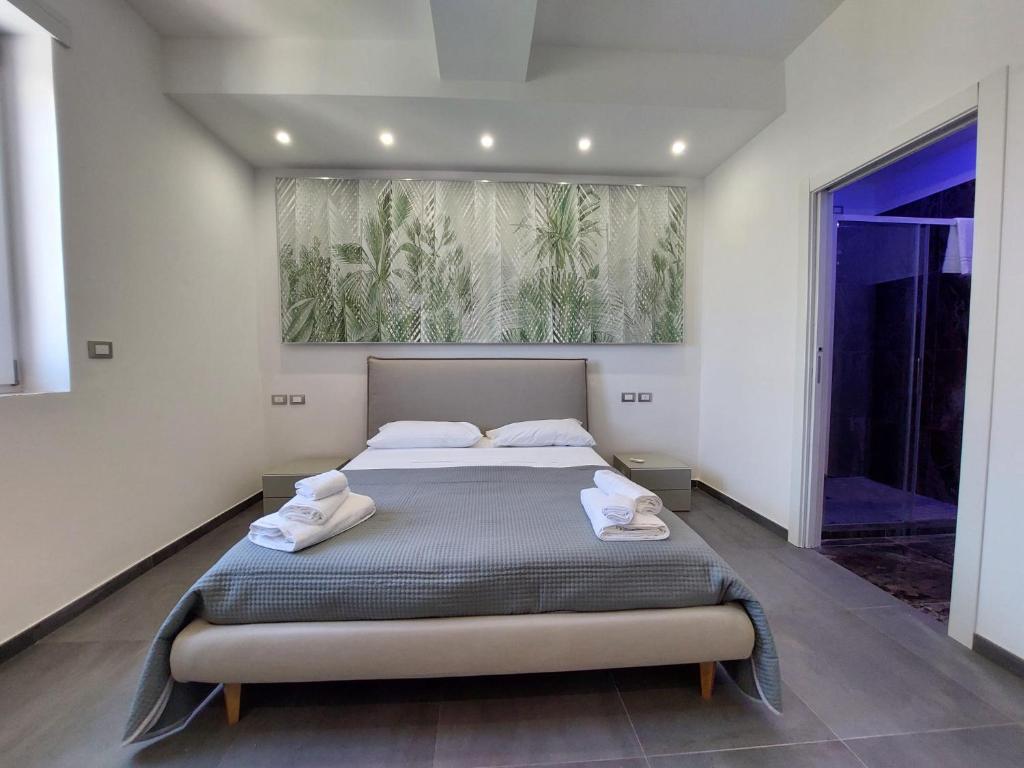 Postel nebo postele na pokoji v ubytování Dimora Gentile Lecce B&B