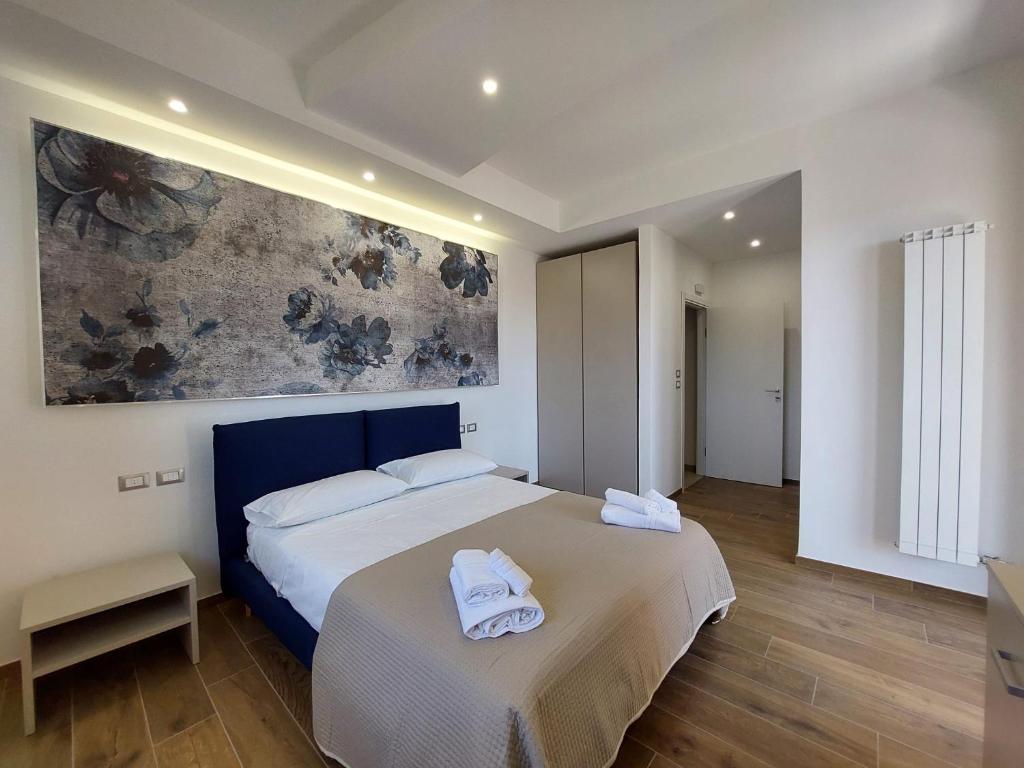 Postel nebo postele na pokoji v ubytování Dimora Gentile Lecce B&B
