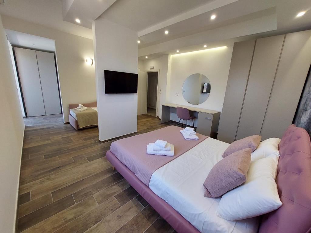 TV a/nebo společenská místnost v ubytování Dimora Gentile Lecce B&B