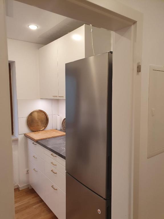 Kuchyň nebo kuchyňský kout v ubytování 80m2 Garten-Duplexwohnung in Altperlach