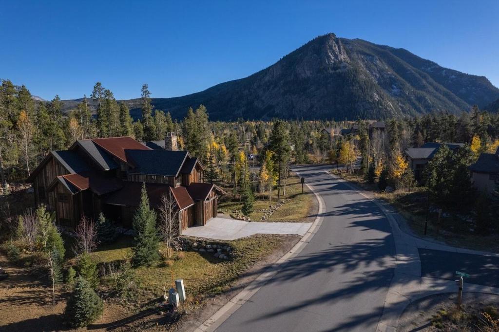an aerial view of a house with a mountain in the background at Mountain Retreat in Frisco
