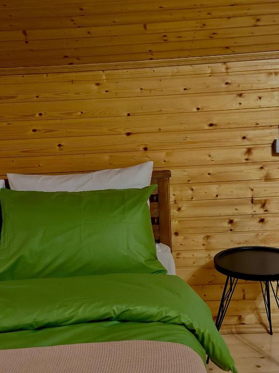 Postel nebo postele na pokoji v ubytování Rakursi