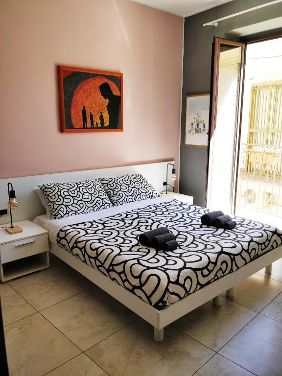 Postel nebo postele na pokoji v ubytování Kalos Rooms
