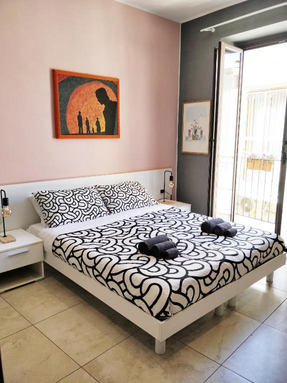 Postel nebo postele na pokoji v ubytování Kalos Rooms