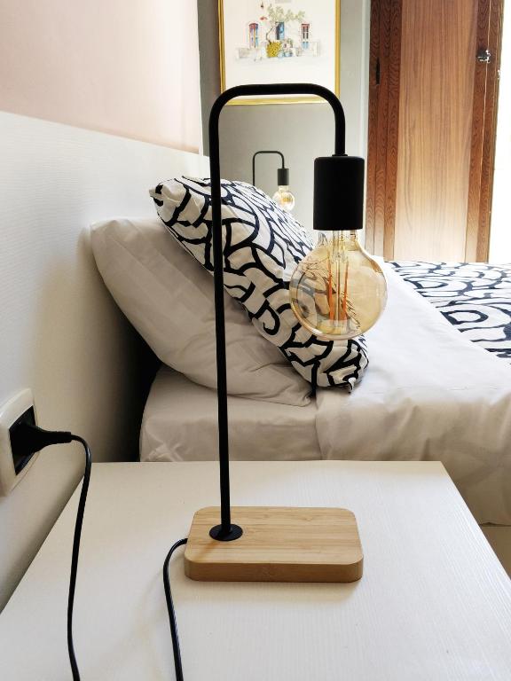 Postel nebo postele na pokoji v ubytování Kalos Rooms