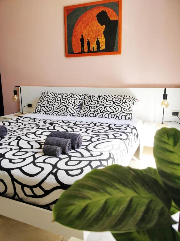 Postel nebo postele na pokoji v ubytování Kalos Rooms