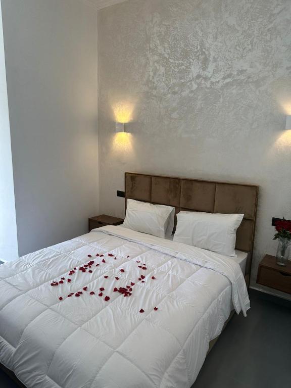 Postel nebo postele na pokoji v ubytování Hotel De Provence