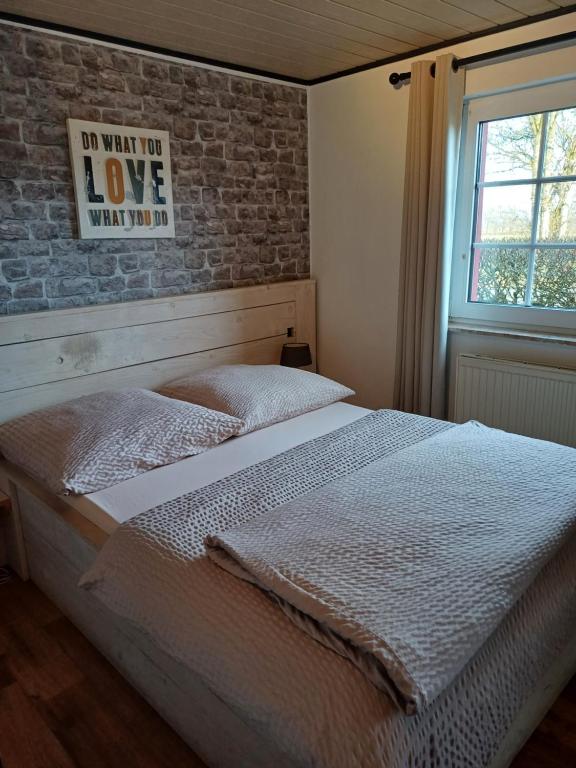 Postel nebo postele na pokoji v ubytování Heidehof Hellenthal