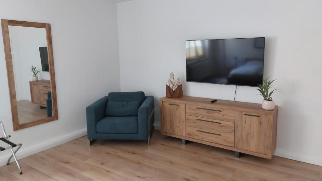 TV a/nebo společenská místnost v ubytování Haus Moritzburg