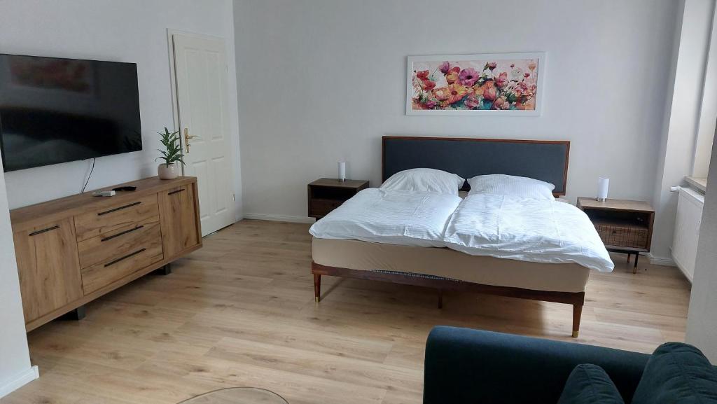 Postel nebo postele na pokoji v ubytování Haus Moritzburg