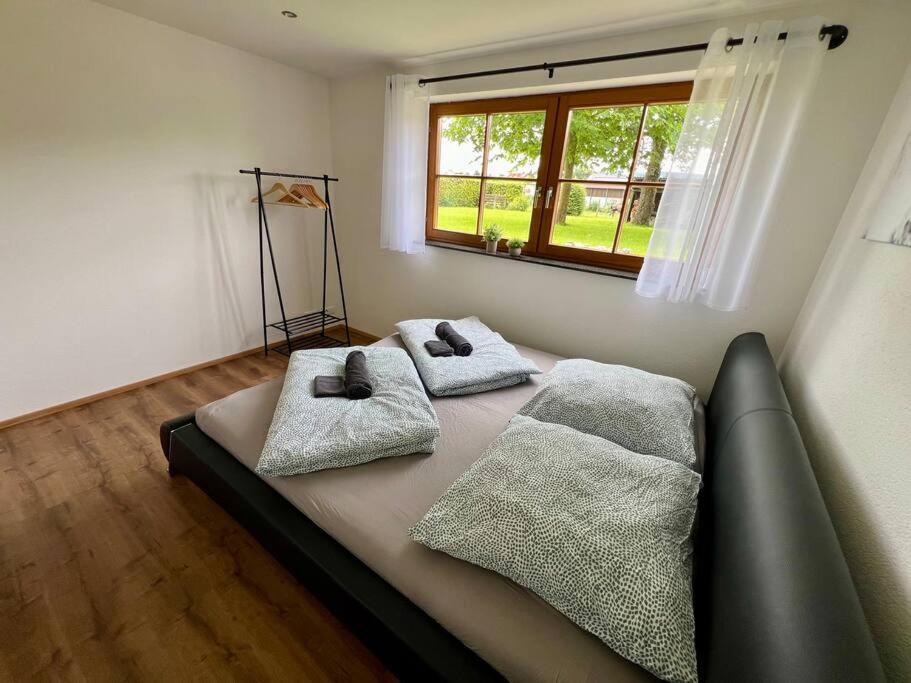 Postel nebo postele na pokoji v ubytování Gartenloft