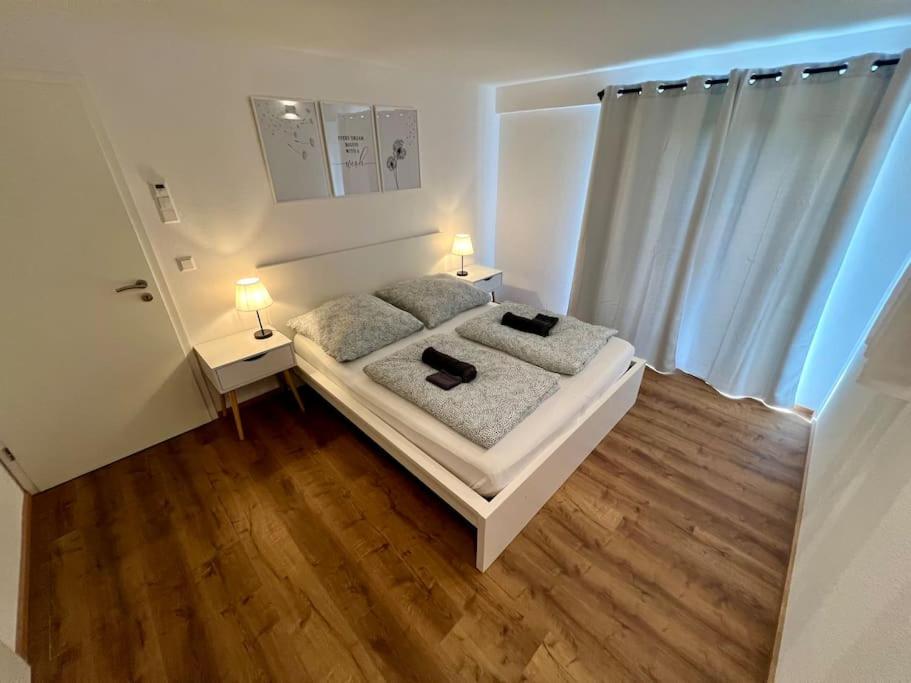 Postel nebo postele na pokoji v ubytování Gartenloft