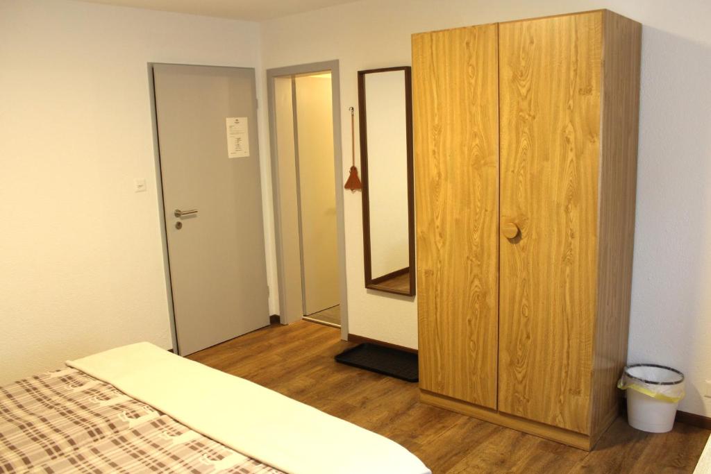 Postel nebo postele na pokoji v ubytování Bonne Auberge Les Bugnenets