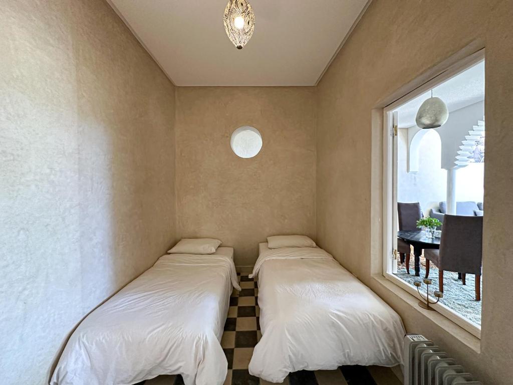 Postel nebo postele na pokoji v ubytování Mar y Montana House