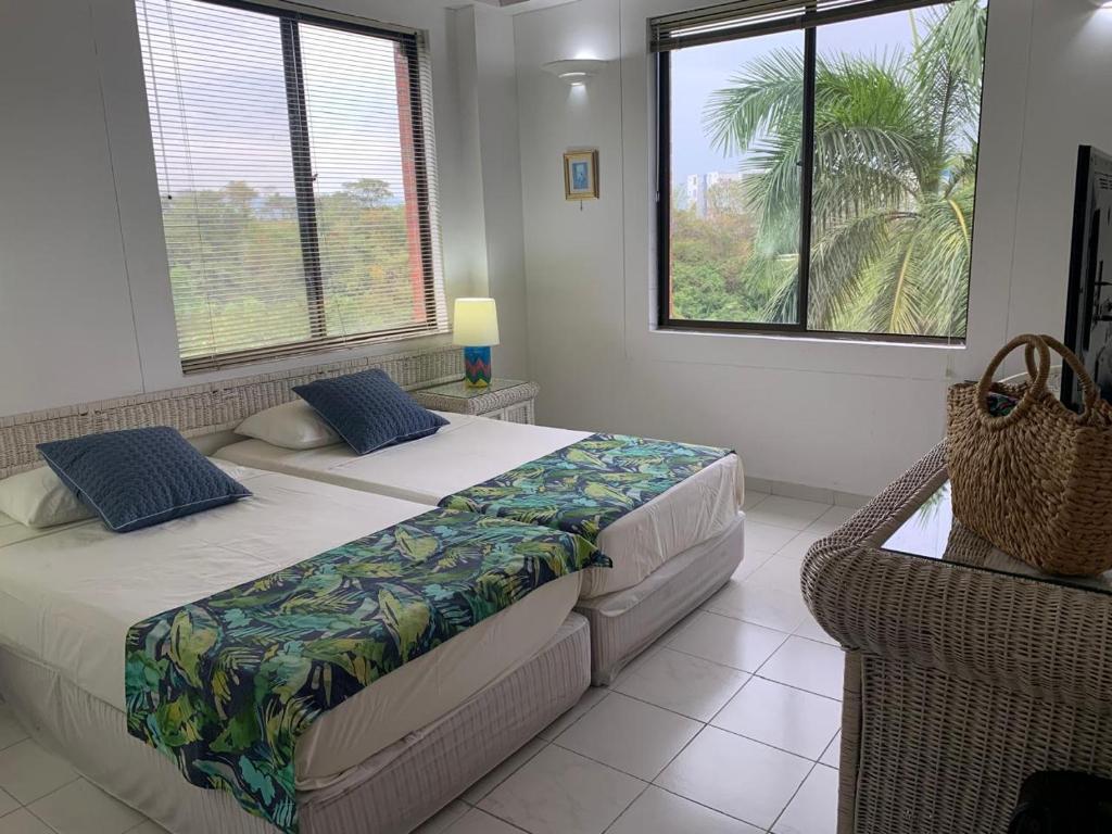 Voodi või voodid majutusasutuse Girardot Resort Ap 6-402 Exclusiva vista panorámica-wi-fi toas