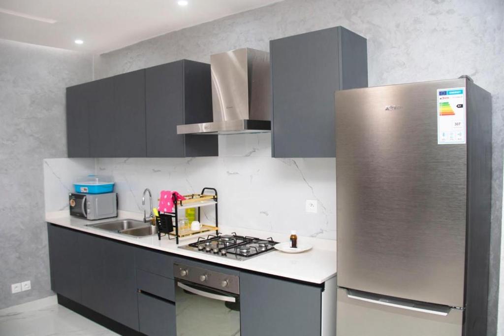 Η κουζίνα ή μικρή κουζίνα στο Résidence de la Renaissance