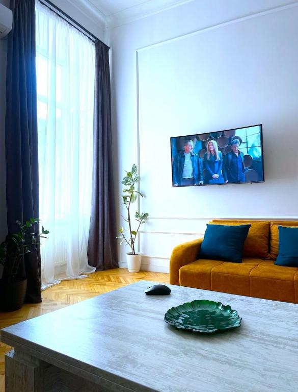 TV a/nebo společenská místnost v ubytování Art Hotel Tabidze