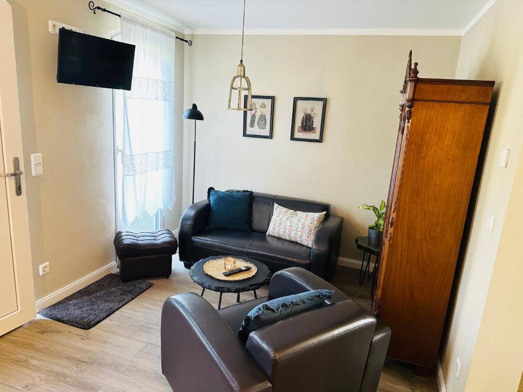Ein Sitzbereich in der Unterkunft Ferienwohnung Zur Alten Tischlerei